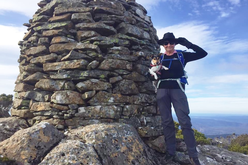 Biscuit the dog with owner Cathy Byrne at summit of Mount Saddleback.