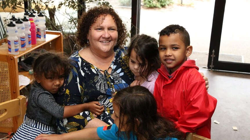 Lisa Thorpe with children at Bubup Wilam child care centre.