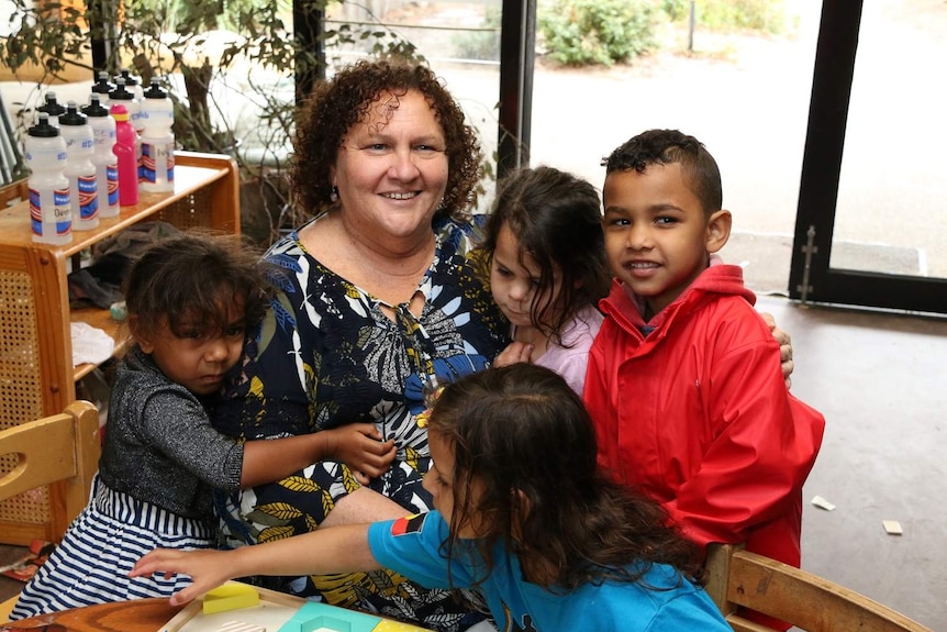 Lisa Thorpe with children at Bubup Wilam child care centre.