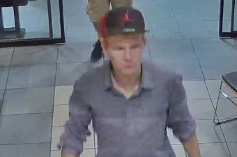 Bradley Breward pictured standing inside a fast food restaurant.