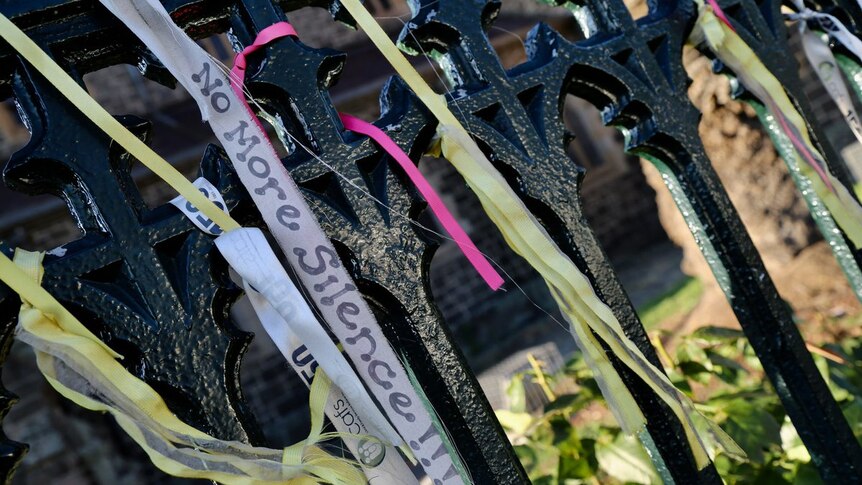 Ribbons outside St Patrick's in Ballarat, tied in support for victims and survivors of sexual abuse.
