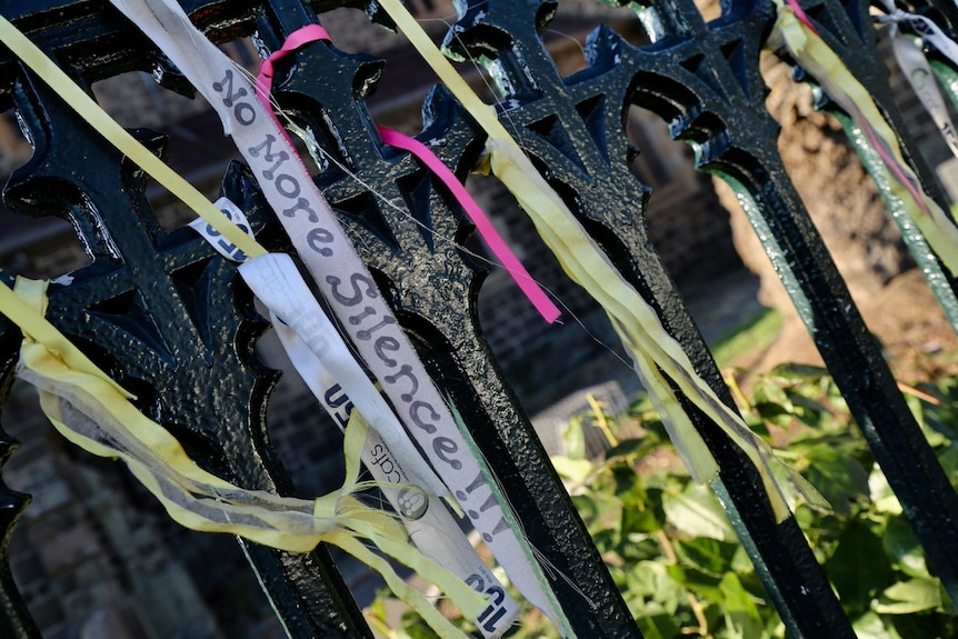 Ribbons outside St Patrick's in Ballarat, tied in support for victims and survivors of sexual abuse.