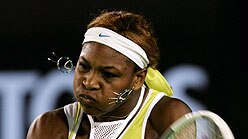 Serena Williams pumps a return
