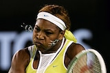 Serena Williams pumps a return