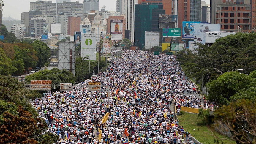 A wide view shows thousands of people filling streets to protest against Venezuela's President.