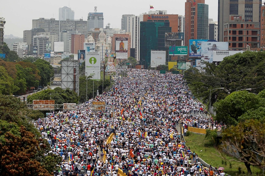 A wide view shows thousands of people filling streets to protest against Venezuela's President.