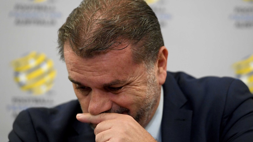 Ange Postecolou holds back the emotion during press conference