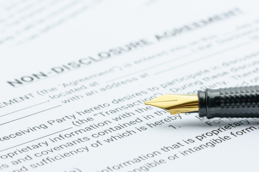 Pen on a mutual confidentiality agreement form. 