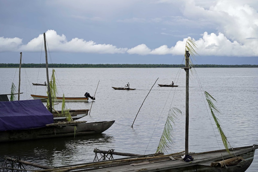 Boats on the water at Daru Island.