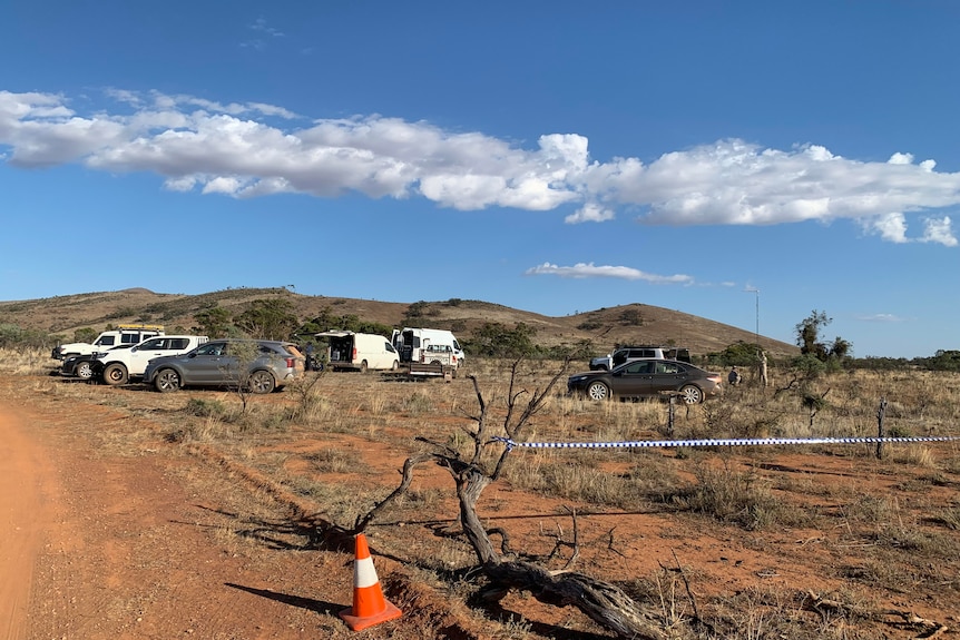 Police cars parked in outback 