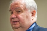 Russian ambassador to the US Sergey Kislyak standing in a suit.