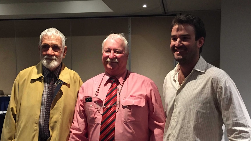 Former owner of Struan Station standing with Elders agent Virgil Kenny and buyer Sam Barton.