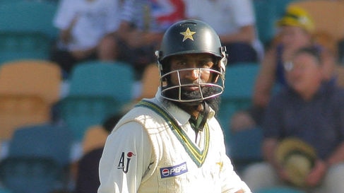 Mohammad Yousuf trudges off after a horrible mix up late in the day.