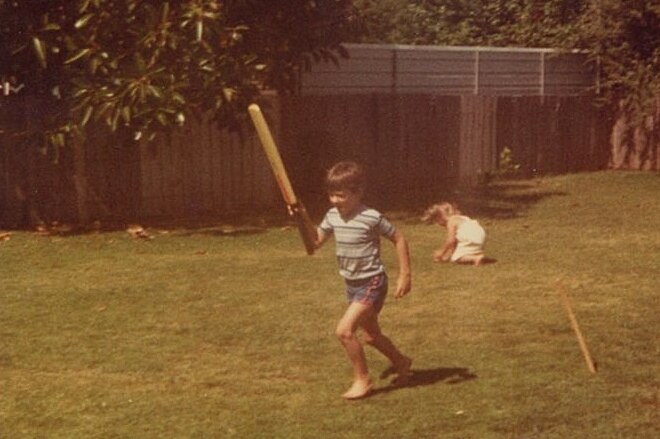 Michael Gunner playing cricket in 1982
