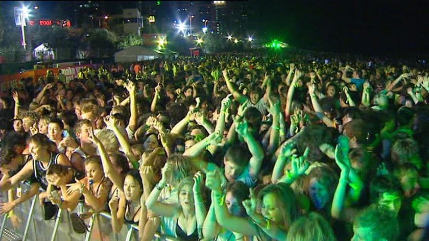 A large crowd partying at Gold Coast schoolies event in city at Surfers Paradise.