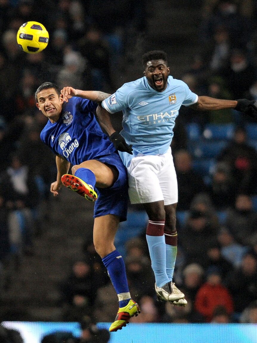 Cahill and Toure fight for the ball