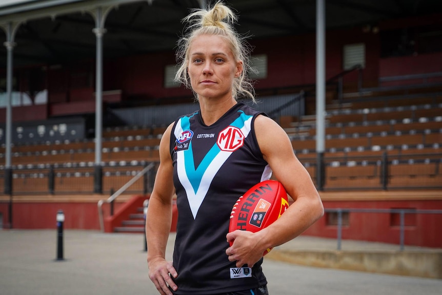 Erin Phillips in a Port Adelaide guernsey