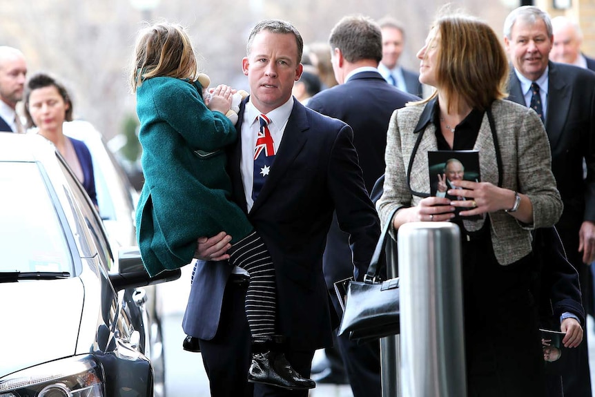 Will Hodgman arrives for his father Michael Hodgman's state memorial.