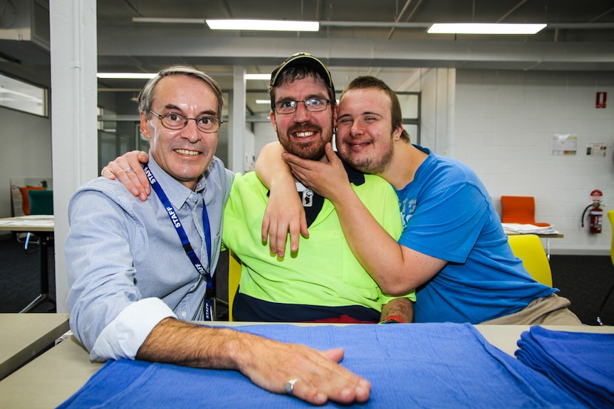 Radius mentor Stephen Rynhart with co-workers and housemates, Todd Briggs and Josh Dickson who both work two days per week.