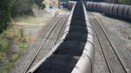 The community group says coal spills over the sides of the wagons under the bridge at Selwyn Street in Mayfield.