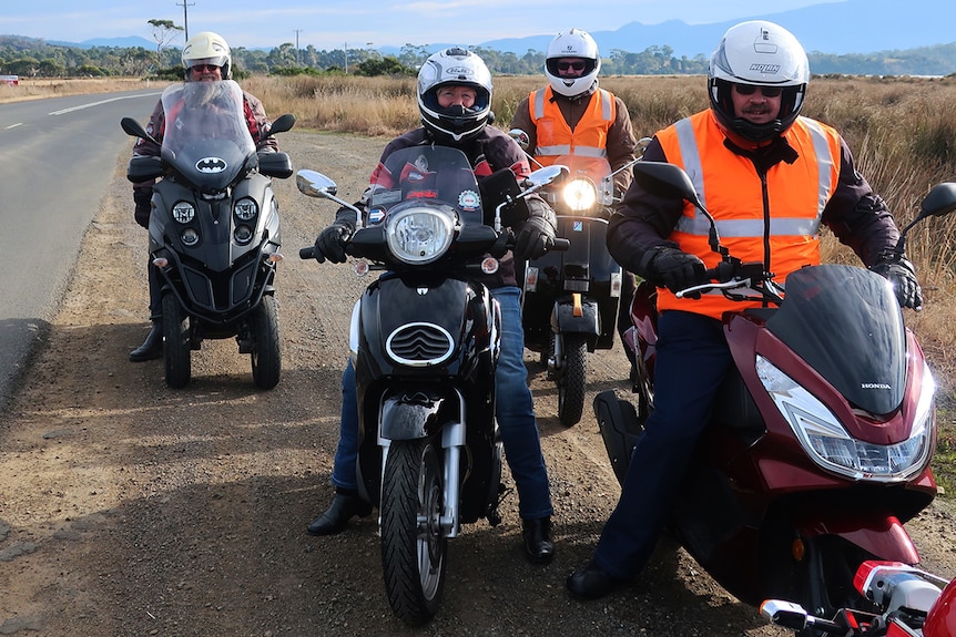 Hobart Motor Scooter Club riders on the side of a road