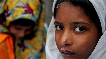 A young survivor of the Pakistan earthquake attends a drawing workshop in Muzaffarabad.
