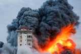 Smoke and flames billow after Israeli forces struck a high-rise tower in Gaza.