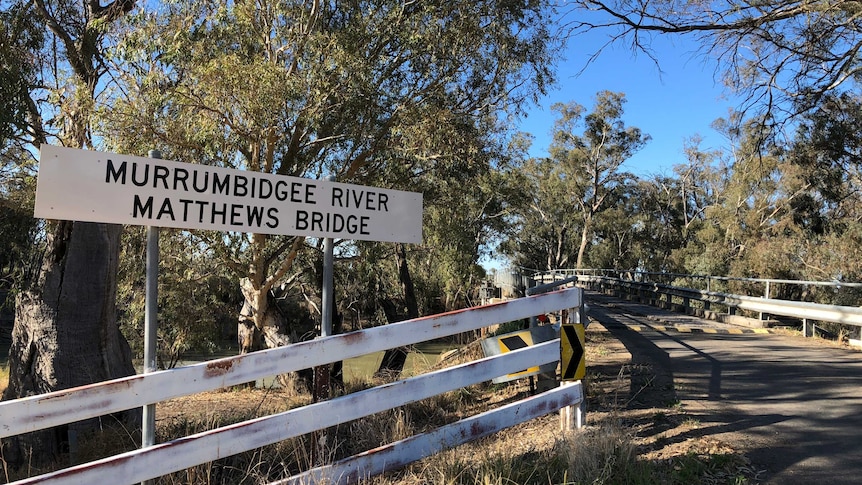 The northern approach to the 1957-built timber Matthews Bridge at Maude in western New South Wales