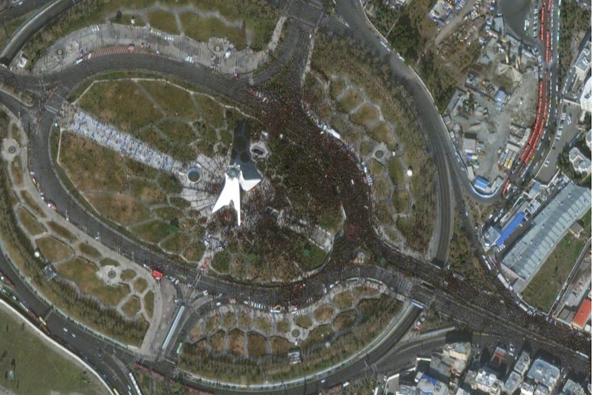 Satellite imagery shows crowds gathering on Azadi Square and on the streets of Tehran.