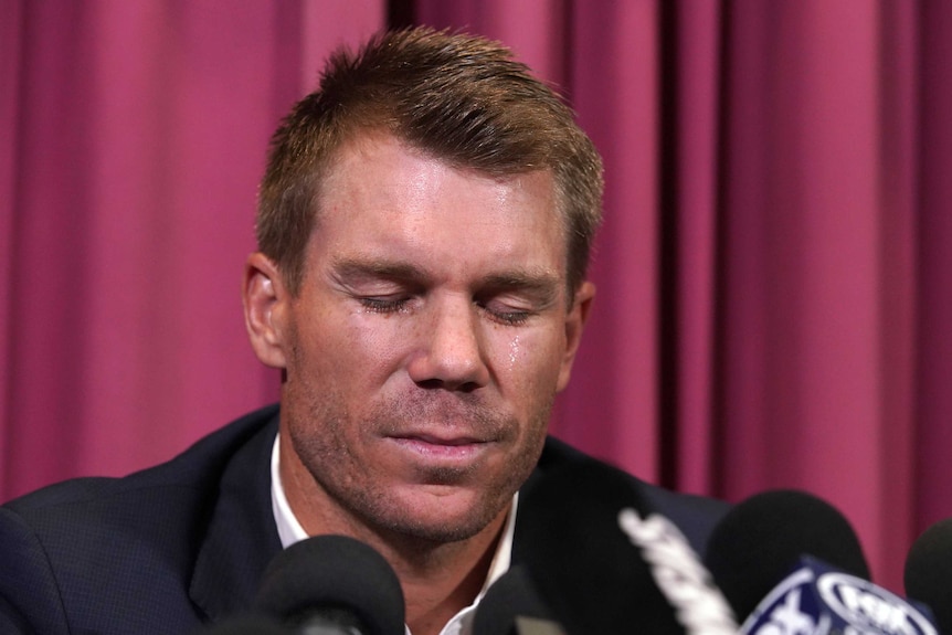Former Australia vice-captain David Warner cries during a press conference.
