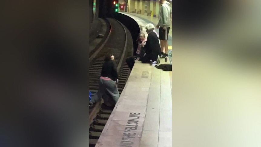 Video captures the moment a Sydney train almost hits people at Redfern ...