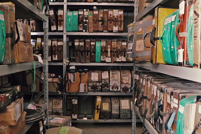 Shelves filled with boxes of old film.