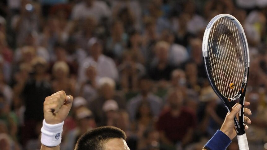 Ecstasy: Djokovic fought back from two breaks of serve in the third set to win his second Australian Open.