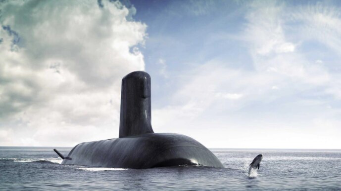 A submarine rises out of the ocean.
