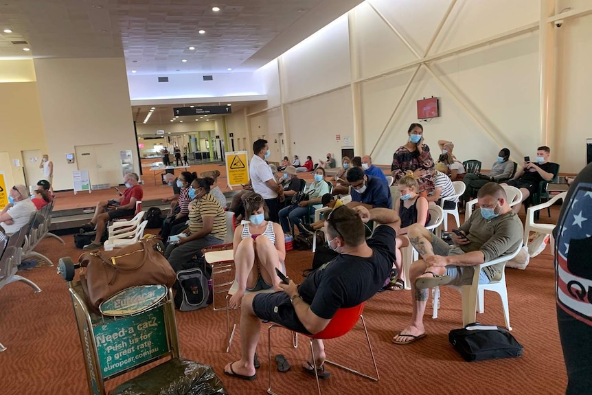 People waiting at Alice Springs Airport.