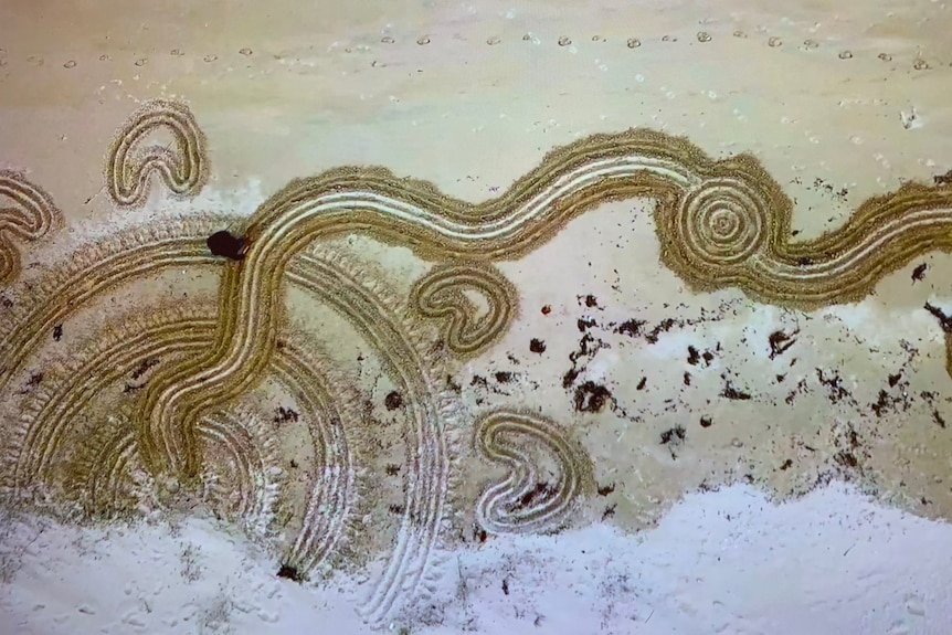 giant sand graphics captured from above by a drone 
