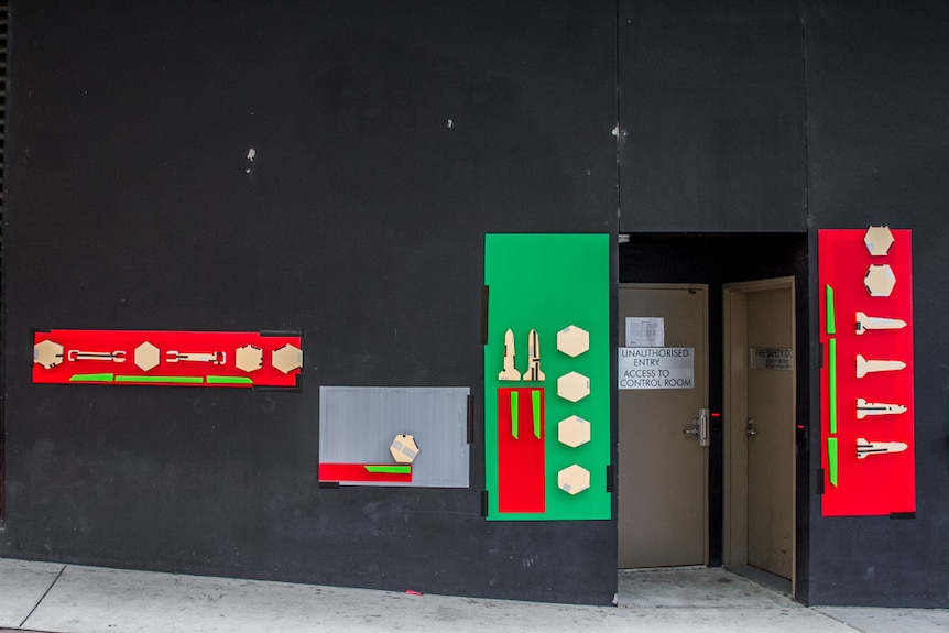 Foam has been used to create 3D images and symbols stuck to the laneway walls with adhesive tape.