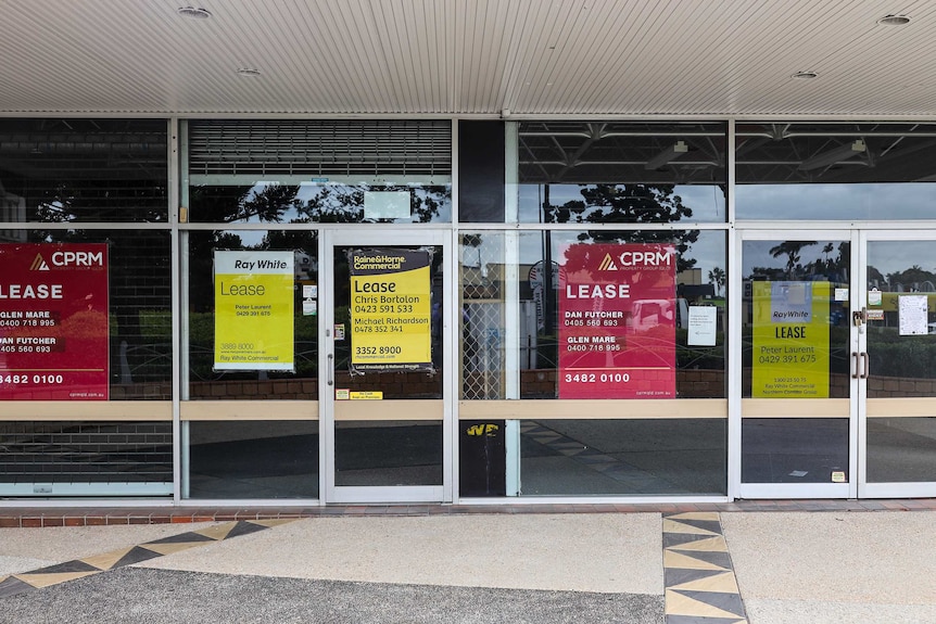 Empty shops on Gympie Road at Strathpine with 'Lease' signs in the window in April 2019.