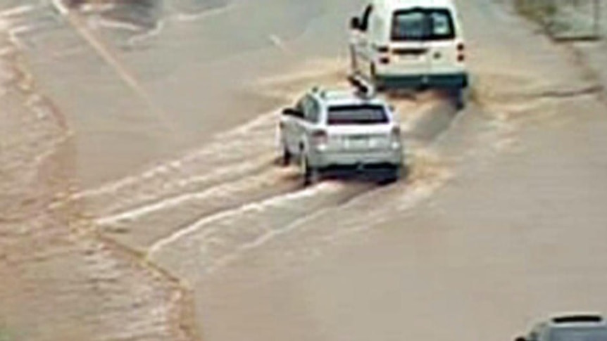 Floodwaters have inundated roads and farmlands in Victoria.
