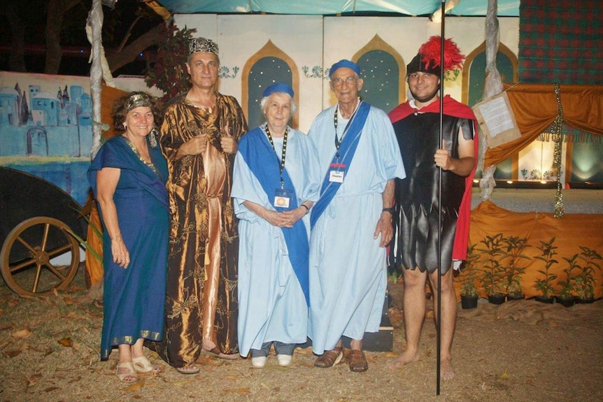A family dressed up in period costume as part of a recreation of the bible story of the birth of Jesus
