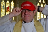 Dean of St David's Cathedral Richard Humphrey with red cap.