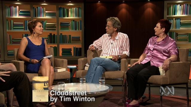 Jennifer Byrne and others sit in discussion on set of First Tuesday Book Club, text overlay reads "Cloudstreet by Tim Winton"