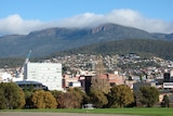 View of Hobart Cityscape from Centotaph with cloud-covered Mount Wellinton backdrop