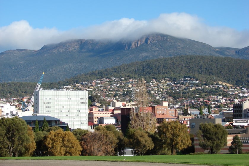 View of Hobart Cityscape from Centotaph with cloud-covered Mount Wellinton backdrop