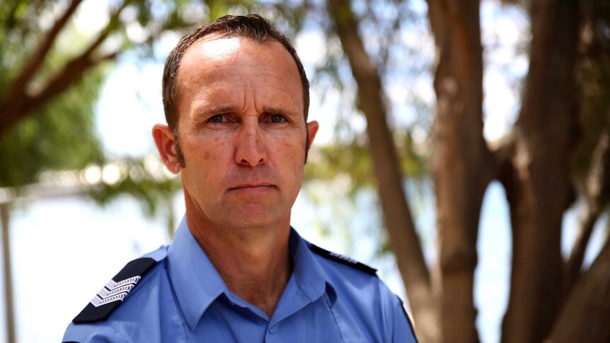 Headshot of a man in police uniform.