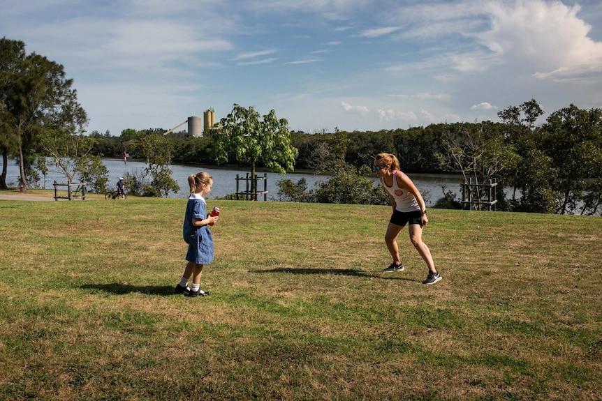 A mother and daughter playing in the reserve