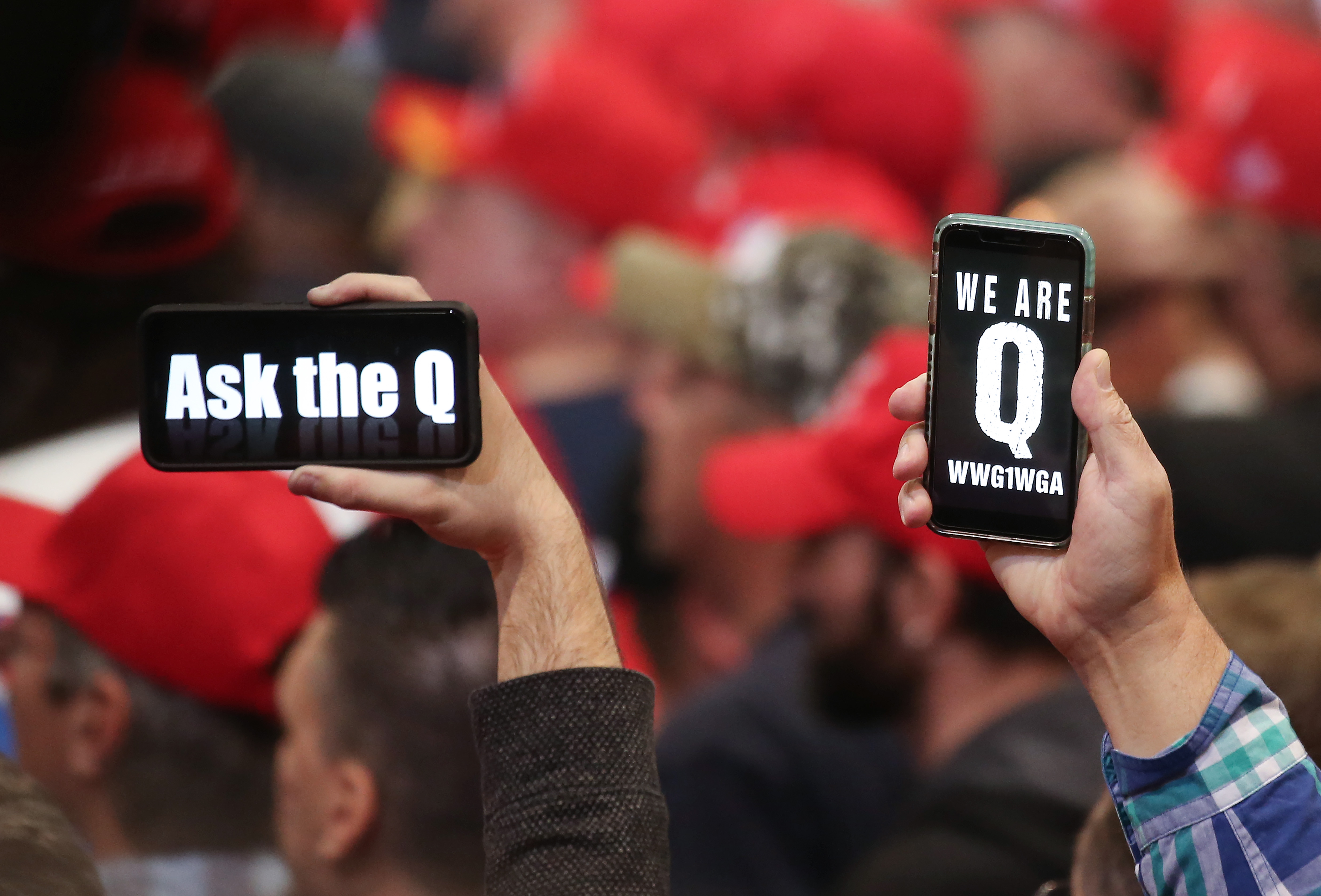 People holding up their phones