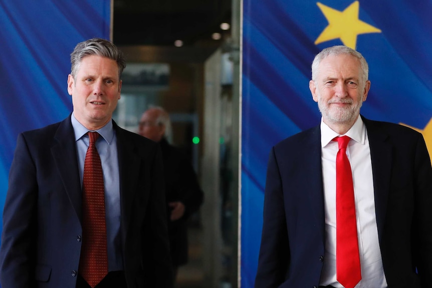 British Labour Party leader Jeremy Corbyn, right, and Keir Starmer, Labour Shadow Brexit secretary, leave EU headquarters