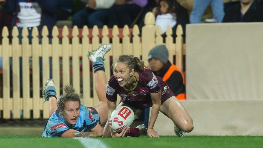 Karina Brown of the Maroons scores