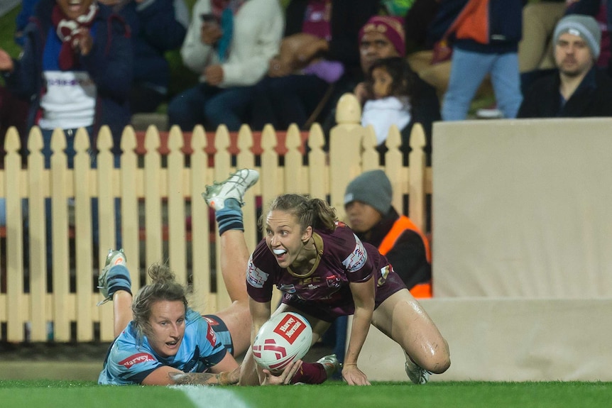 Karina Brown of the Maroons scores